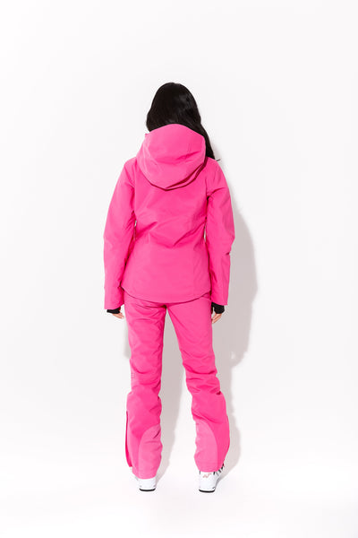 Woman wearing Alpenglow ski jacket