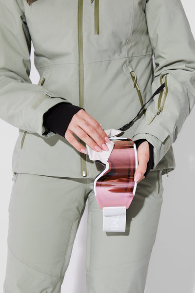 Woman wearing Sage ski jacket