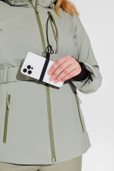 Woman wearing Sage belted jacket