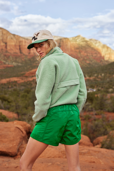 Woman Wearing Verdant Green Nylon Shorts