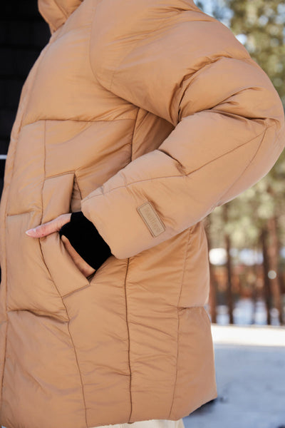 Woman Wearing Chai Colored Parka Puffer Jacket