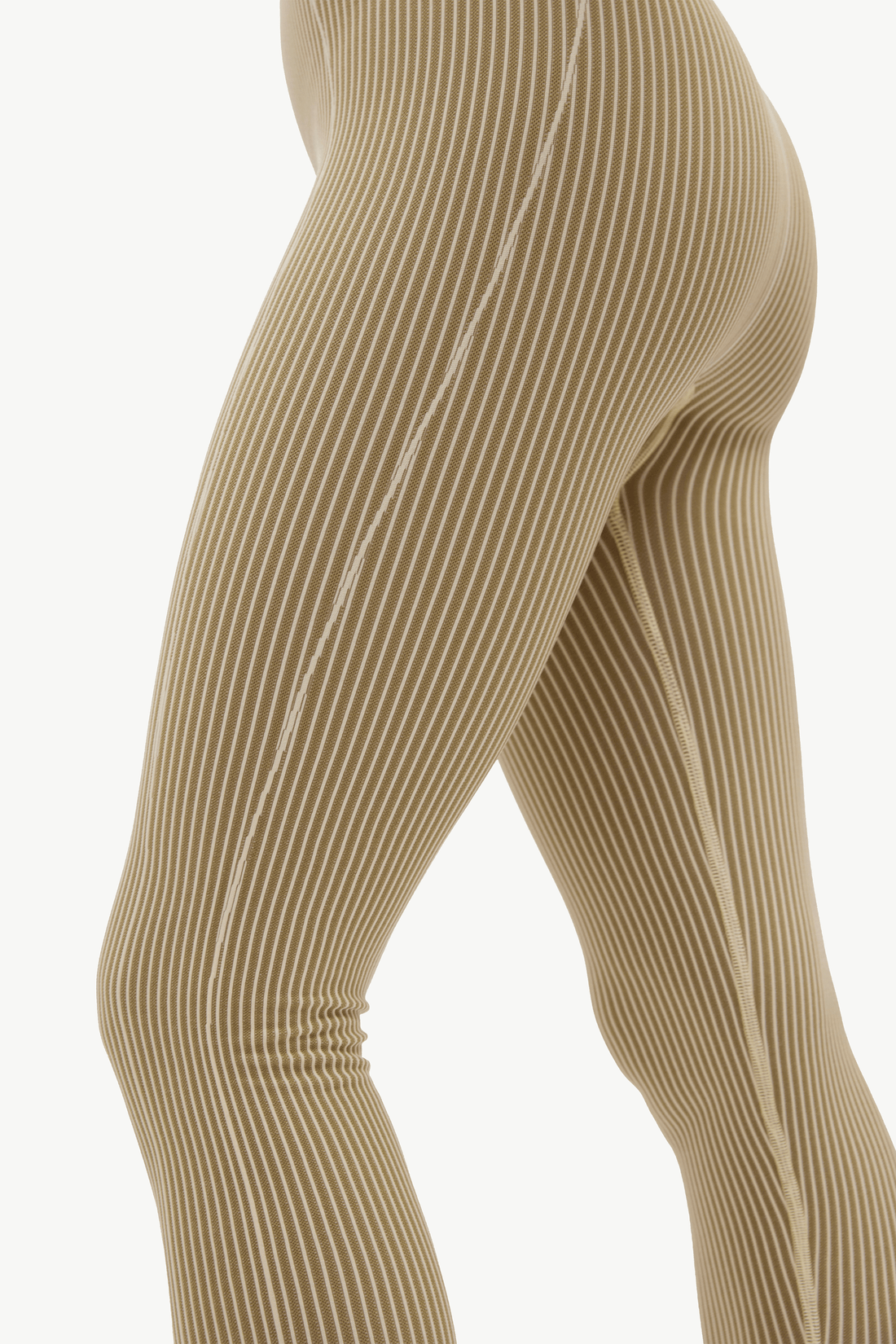 Close-up of a person's legs wearing beige ribbed leggings with vertical pinstripes, shown against a plain white background.