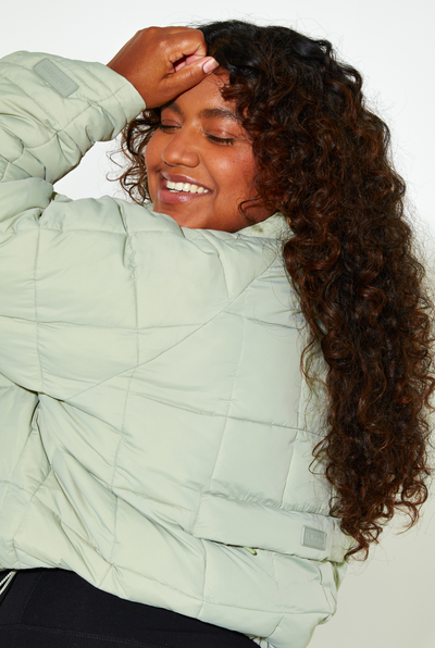 Woman Wearing Sage Nellie Packable Puffer