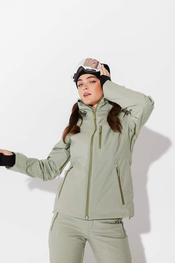 Woman wearing Sage ski jacket