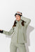 Woman wearing Sage ski jacket