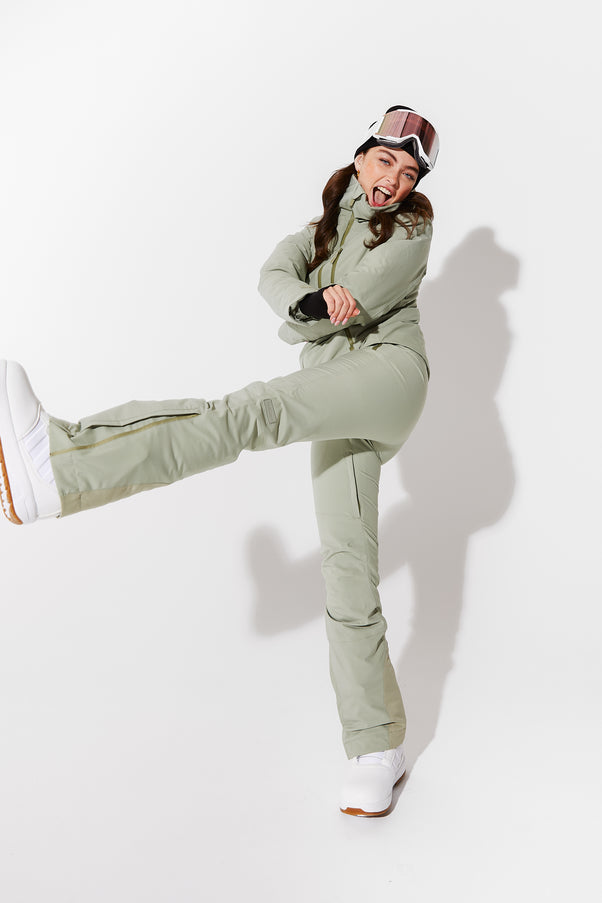 Woman wearing Sage ski jacket