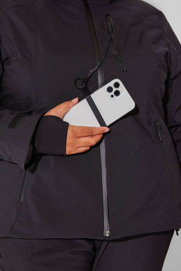 Woman wearing Black ski jacket