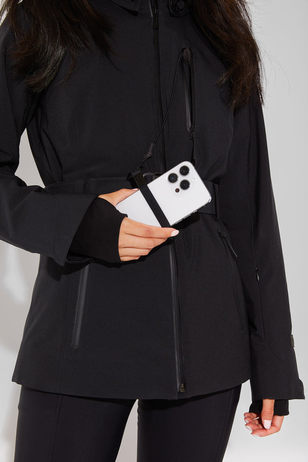 Woman wearing Black belted jacket