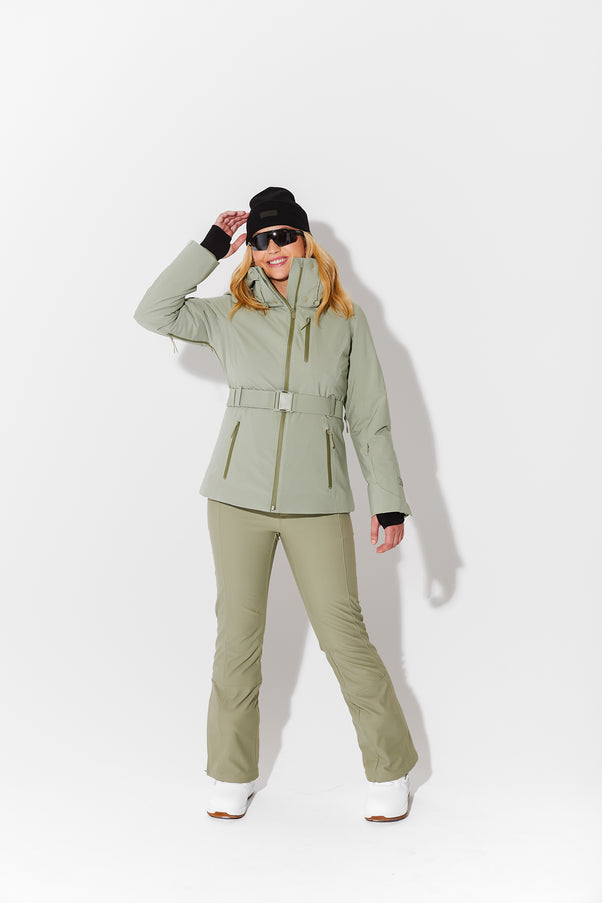 Woman wearing Sage belted jacket