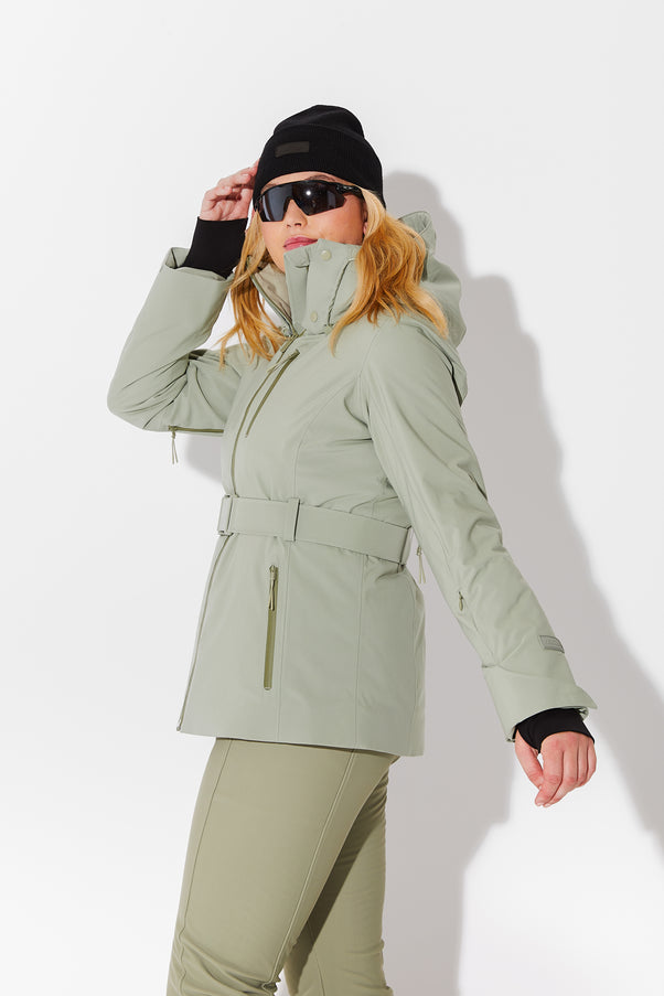 Woman wearing Sage belted jacket