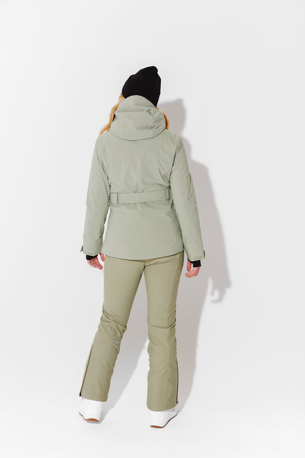 Woman wearing Sage belted jacket