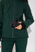 Woman wearing Alpine Green ski jacket