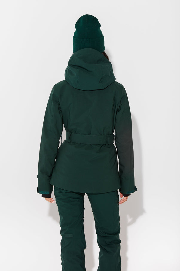 Woman wearing Alpine Green belted jacket
