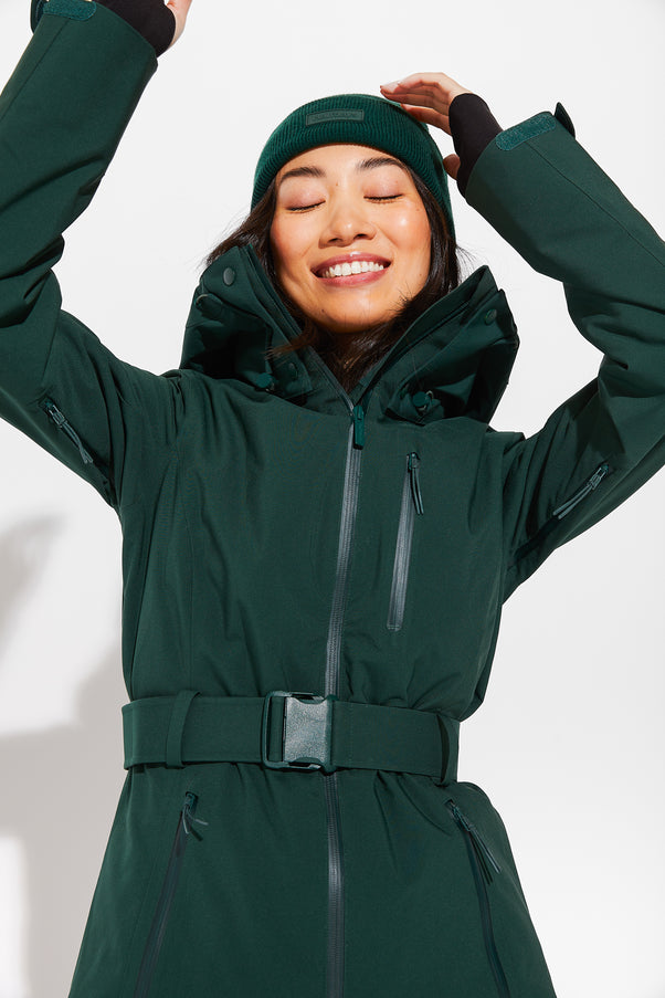 Woman wearing Alpine Green belted jacket