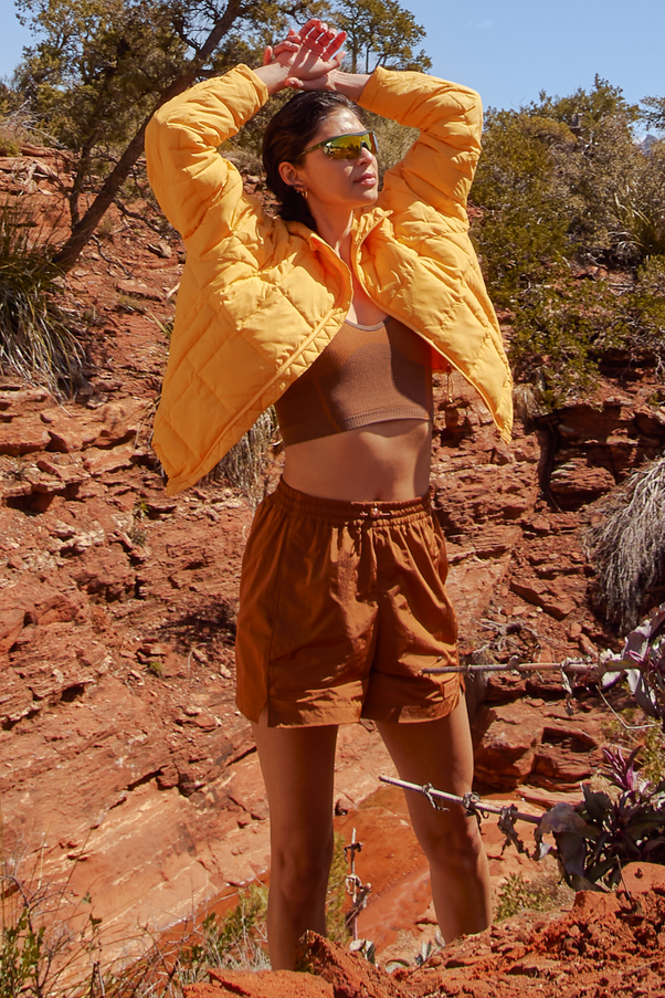 Woman Wearing Caramel Colored Nylon Shorts