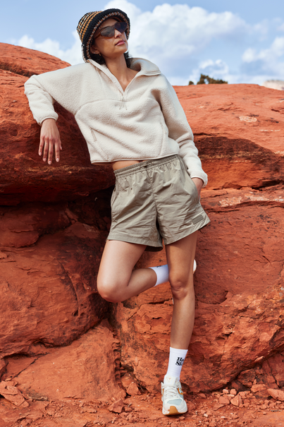 Woman Wearing Lava Rock Gray Colored Nylon Shorts