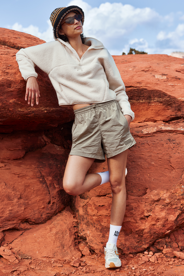 Woman Wearing Lava Rock Gray Colored Nylon Shorts