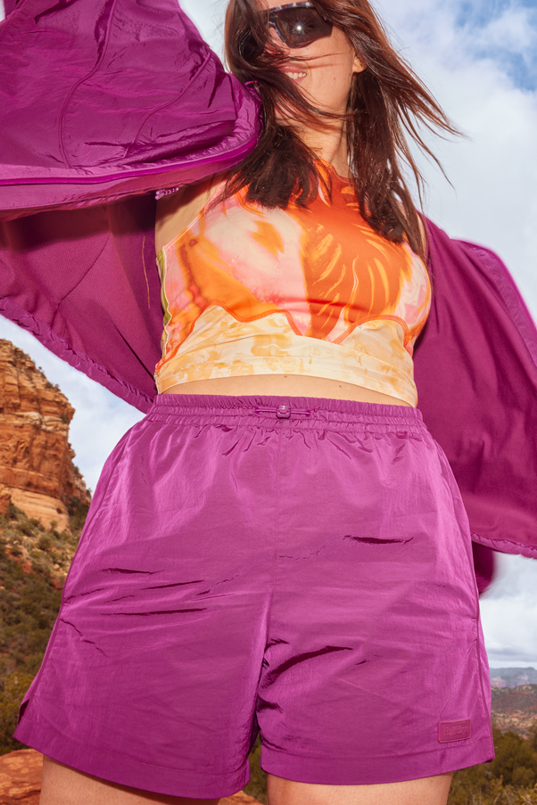 Woman Wearing Loganberry Pink Nylon Shorts