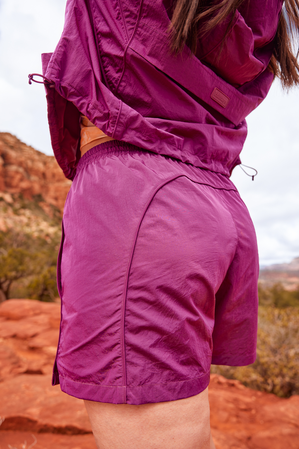 Woman Wearing Loganberry Pink Nylon Shorts