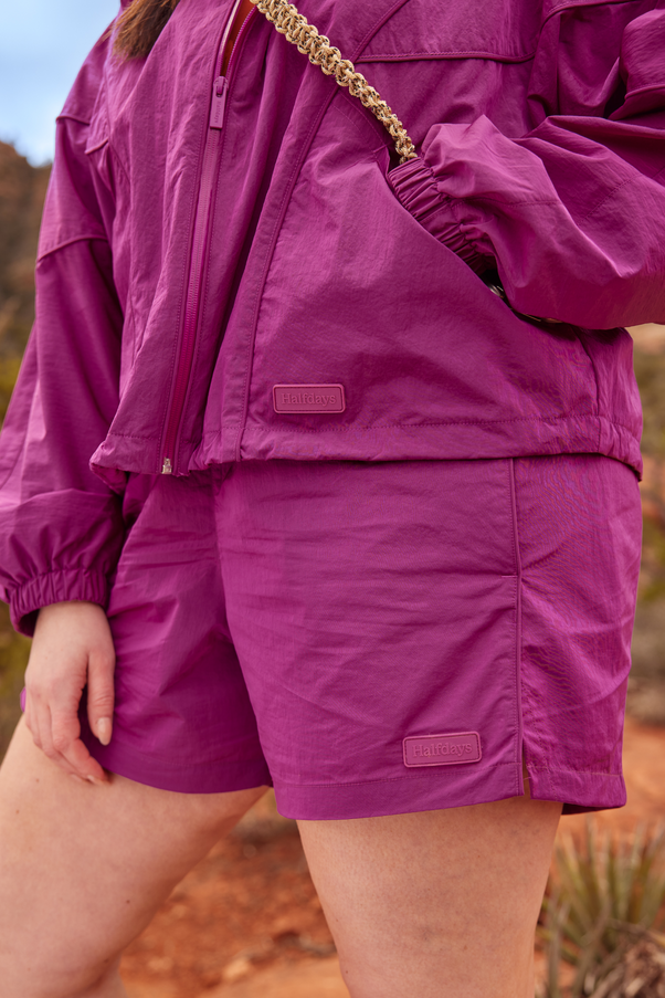Woman Wearing Loganberry Pink Nylon Shorts