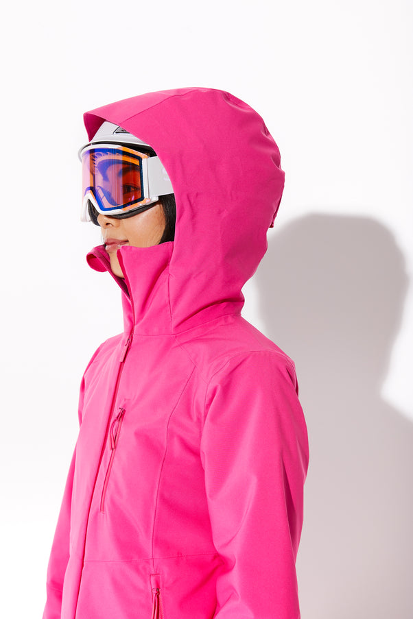 Woman wearing Alpenglow ski jacket