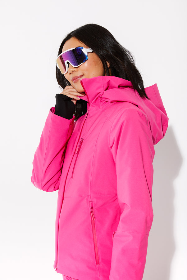 Woman wearing Alpenglow ski jacket