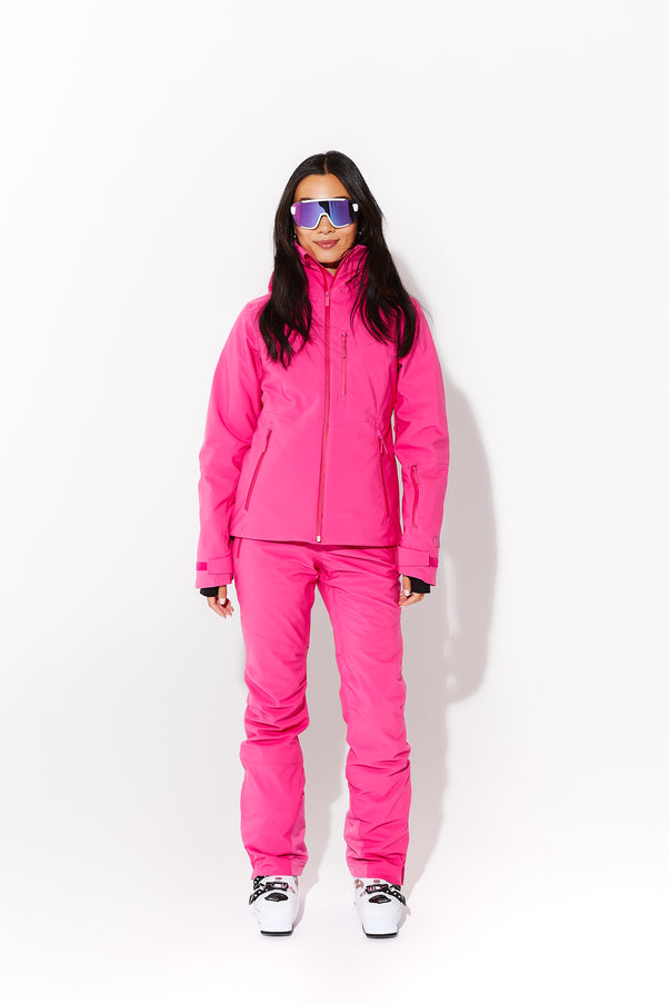 Woman wearing Alpenglow ski jacket