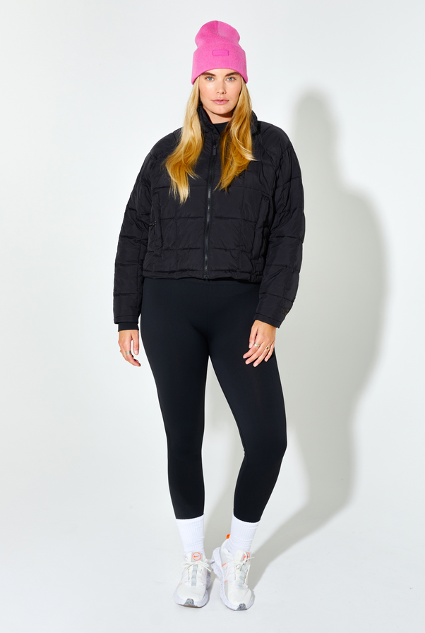 Woman Wearing Blue Bird Nellie Packable Puffer