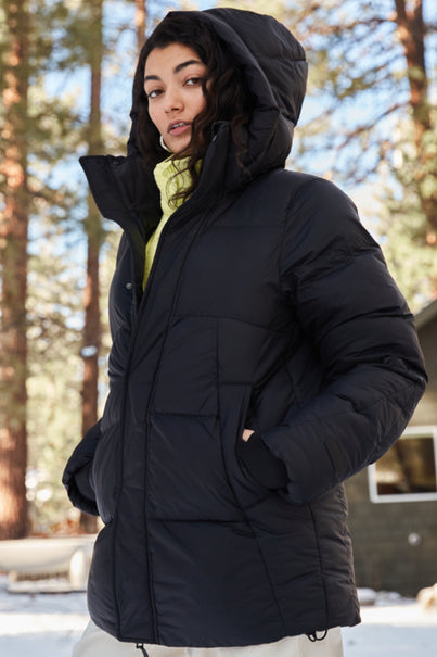 Woman Wearing Black Parka Puffer Jacket