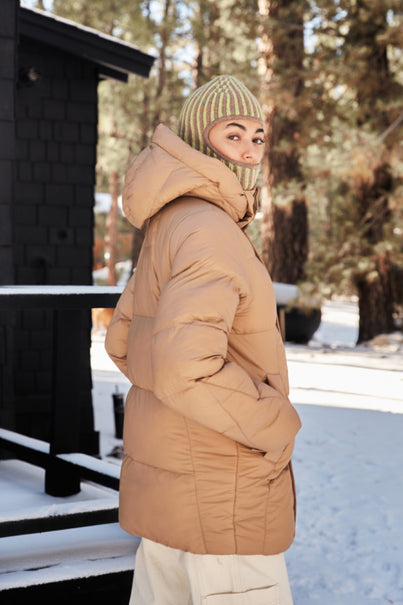 Woman Wearing Chai Colored Parka Puffer Jacket