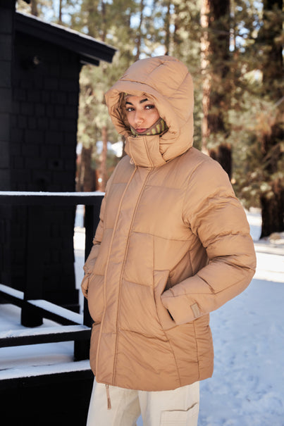Woman Wearing Chai Colored Parka Puffer Jacket