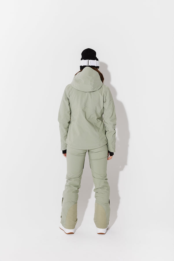 Woman wearing Sage ski jacket