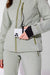 Woman wearing Sage ski jacket