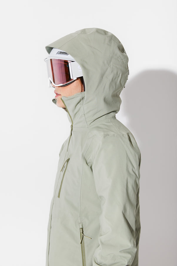 Woman wearing Sage ski jacket