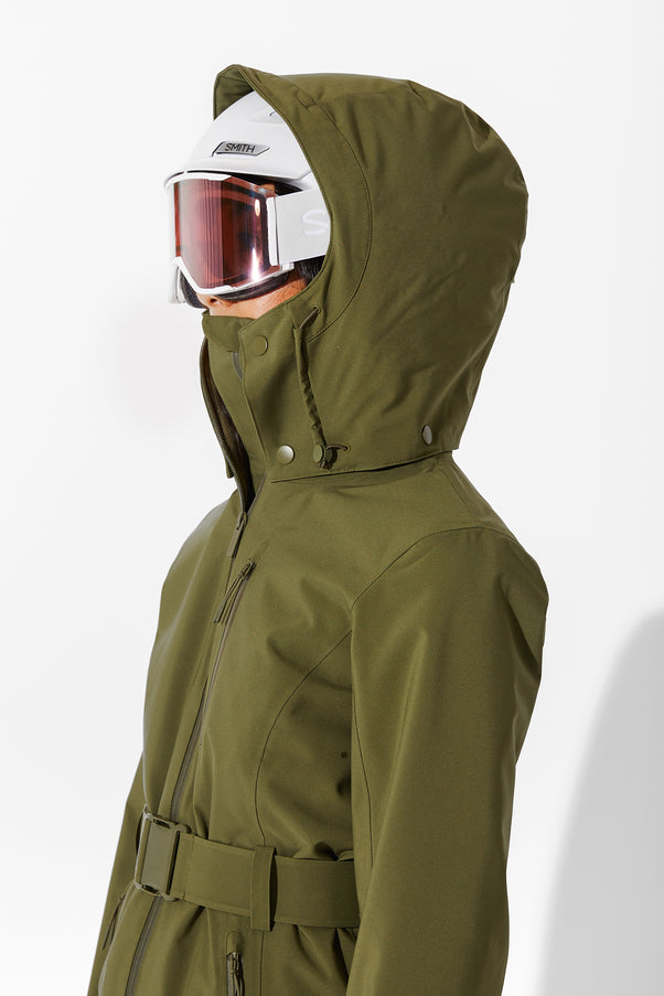 Woman wearing Olive belted jacket