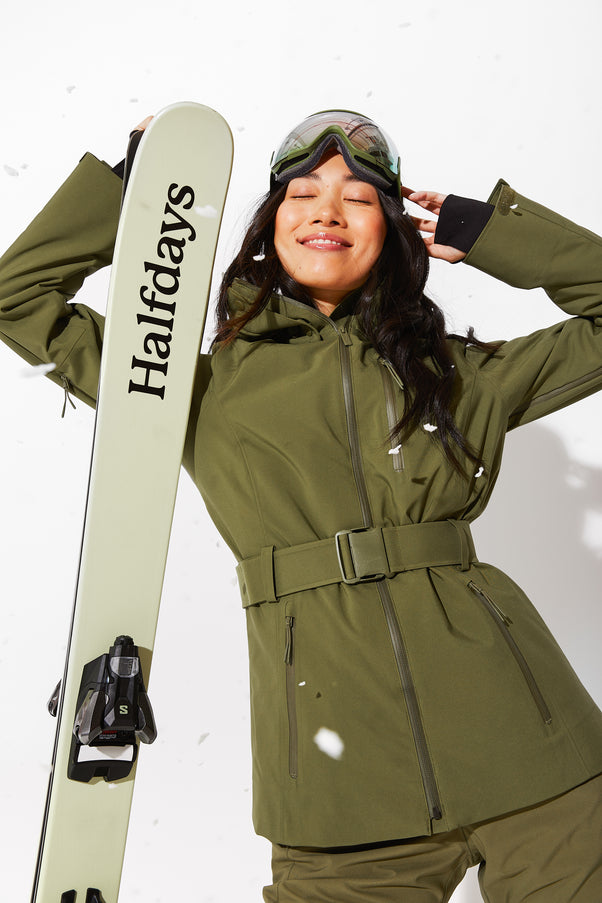 Woman wearing Olive belted jacket