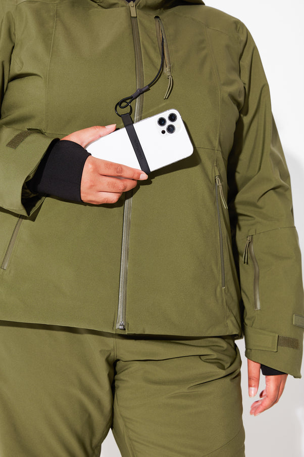 Woman wearing Olive ski jacket