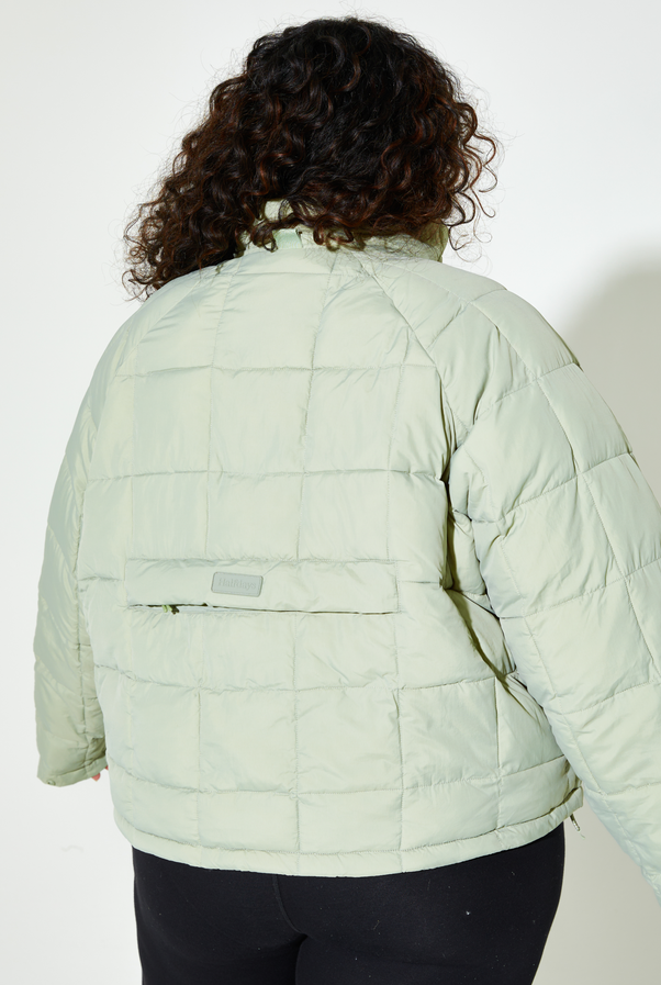 Woman Wearing Sage Nellie Packable Puffer