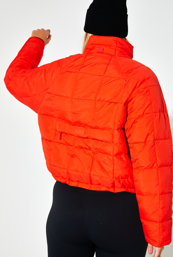 Woman Wearing Spritz Nellie Packable Puffer